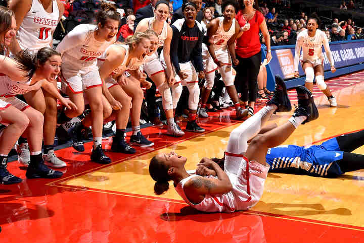 Dayton's Shakeela Fowler reacts to being fouled late in the game by Theresa Onwuka of Buffalo.